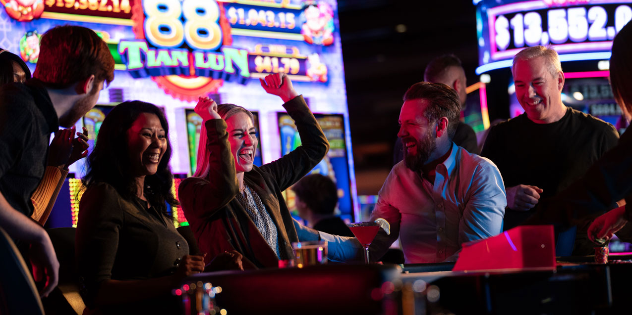 Guests cheering on the casino floor