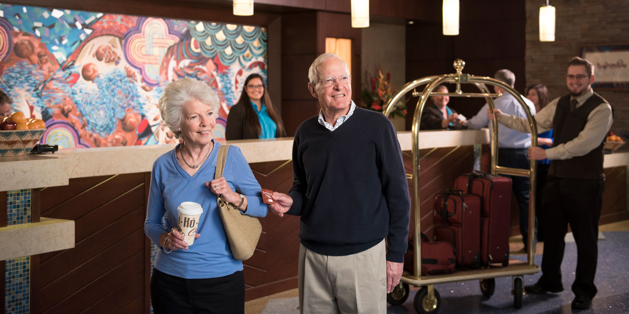 Couple checking in at Downstream casino resort hotel