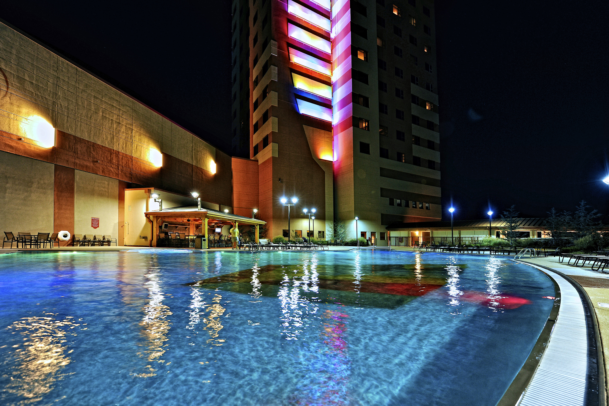 Resort pool with guests lounging